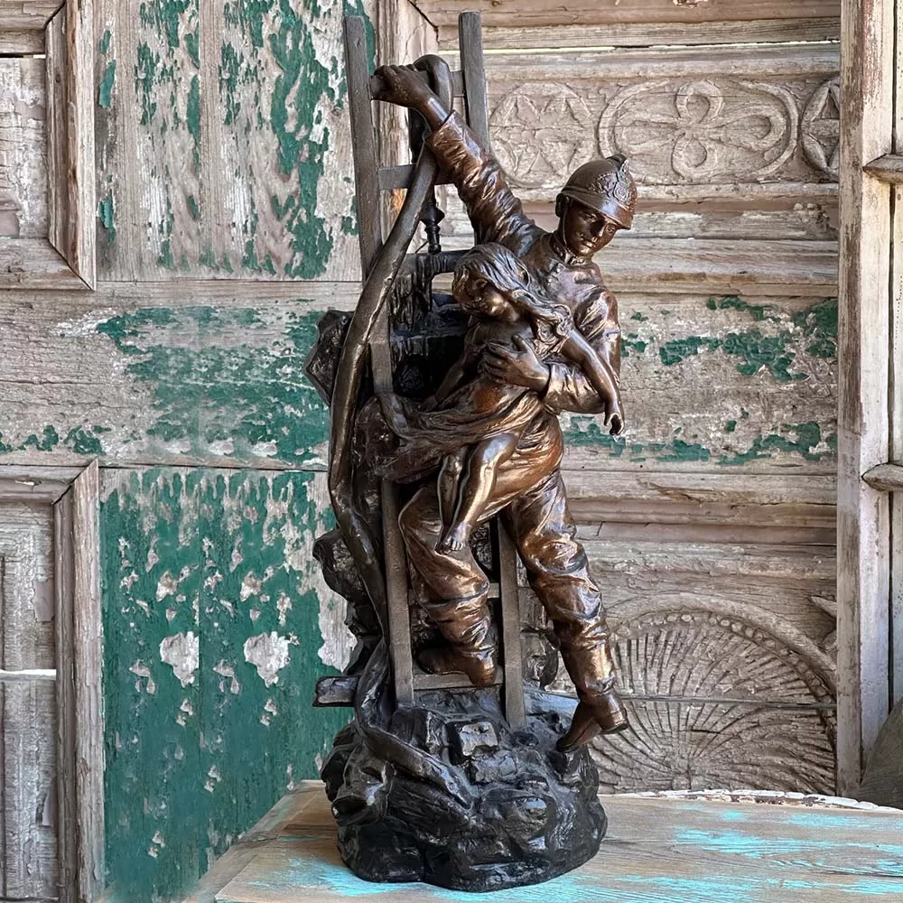 Fireman And Child Spelter Sculpture